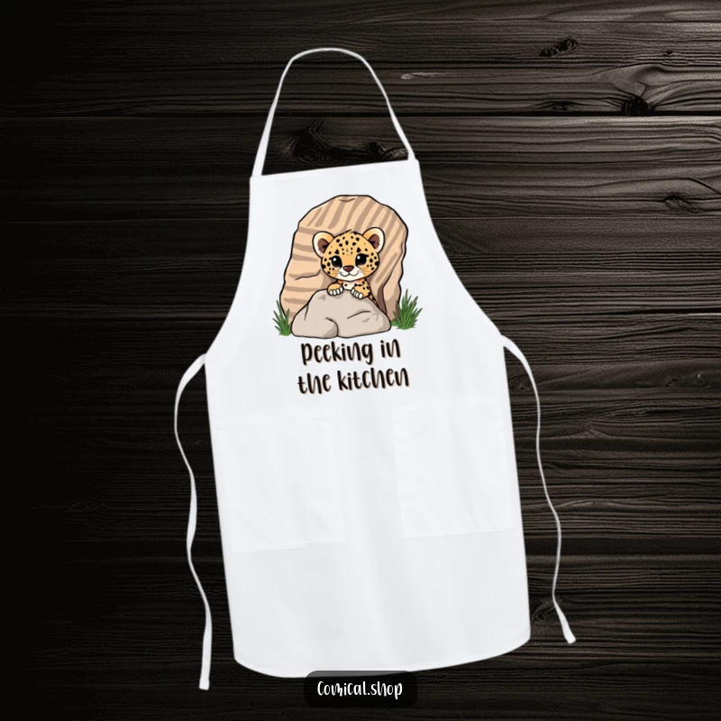 Funny cheetah cub peeking from a striped rock on a kitchen apron, adding playful charm for screen readers.