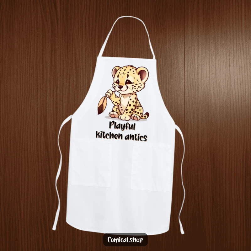 Funny cheetah cub apron showing a playful cub batting at a dangling feather, ready to cook.