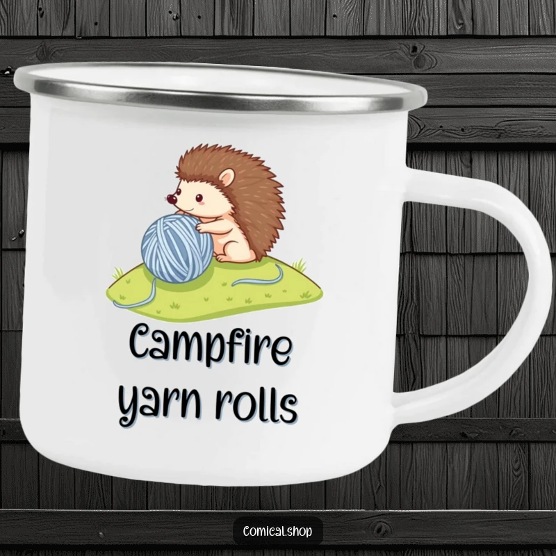 Funny camping mug featuring a small hedgehog rolling a large ball of yarn, perfect for enjoying drinks outdoors.
