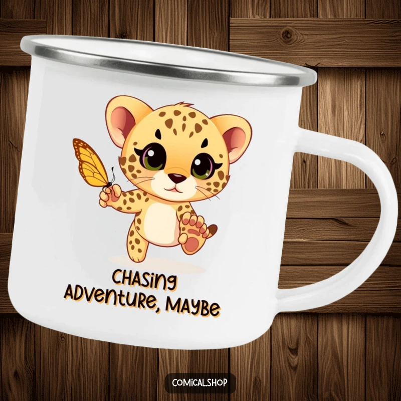 Funny cheetah cub playfully chasing a butterfly with wide eyes, a durable and humorous camping mug for playful adventures.