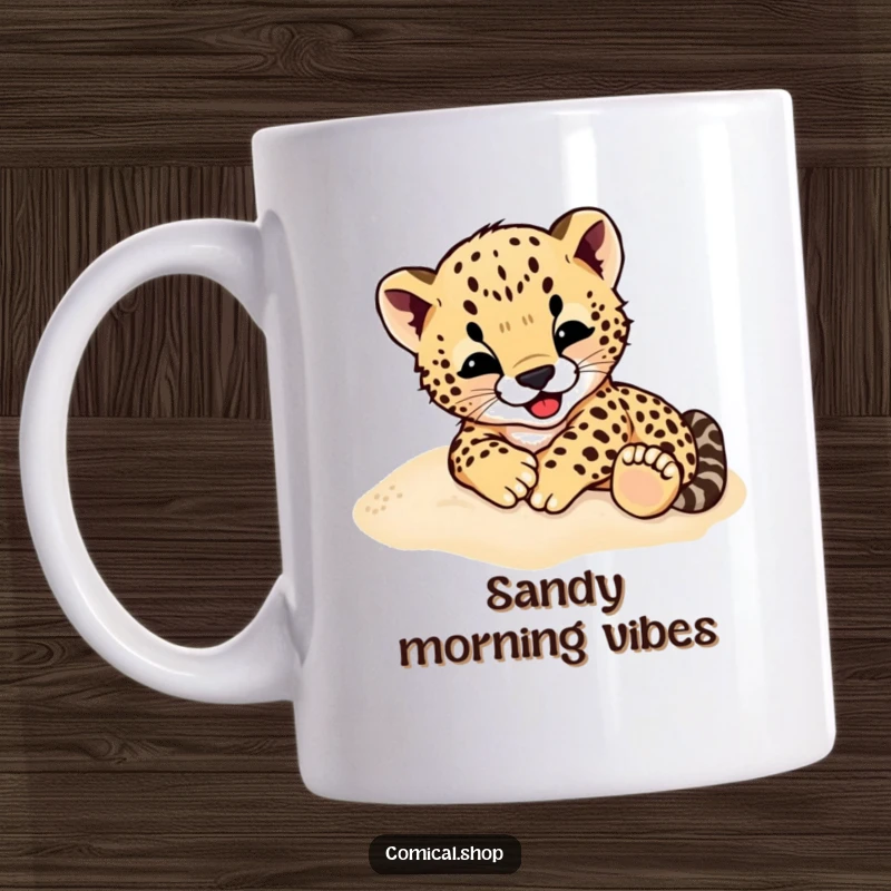 Funny Cheetah Cub Mug: A cute cheetah cub gleefully rolling around in soft sand, embodying playful energy.