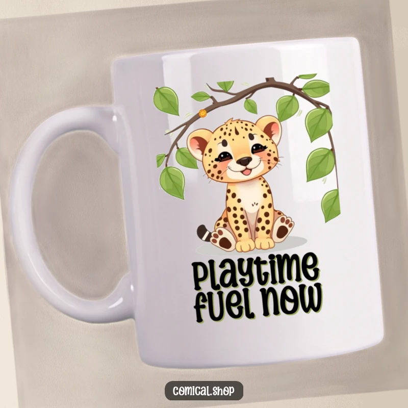 Funny cheetah cub mug depicting a playful cub happily batting at a dangling vine, full of jungle adventure and wild energy.