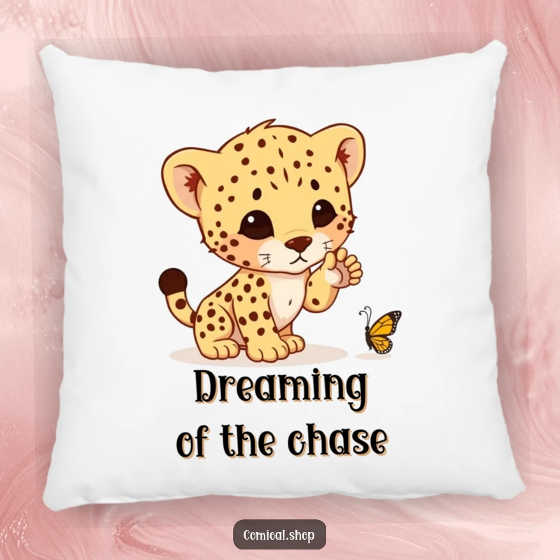 Funny pillow featuring a charming cheetah cub mid-pounce, playfully targeting a tiny butterfly, ideal for adding humor to any room.