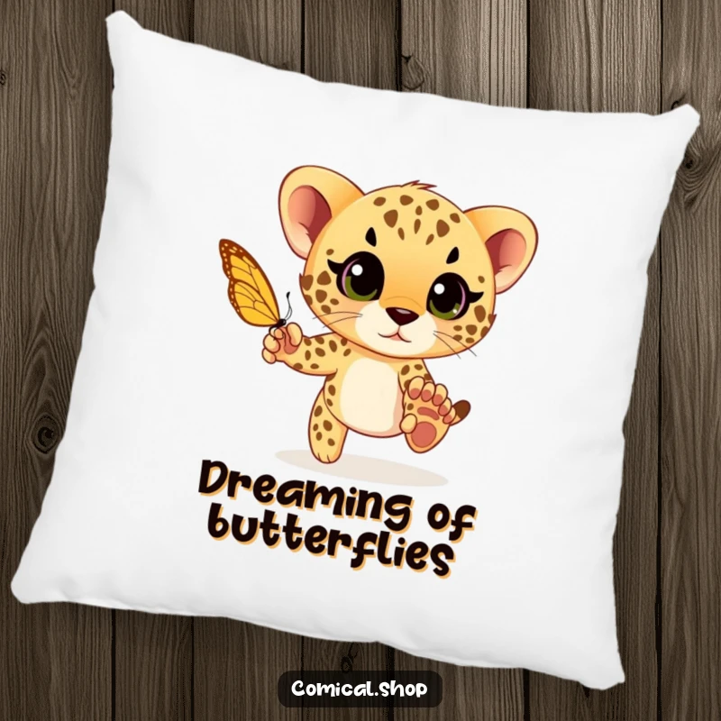 Funny cheetah cub playfully chasing a butterfly with wide eyes, a soft and humorous pillow designed for playful comfort.
