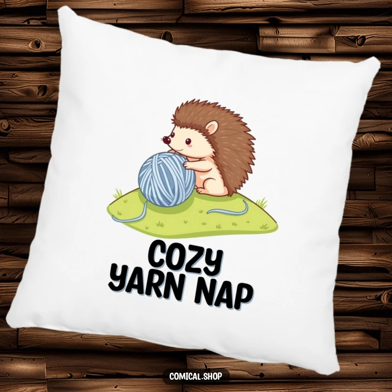 Funny pillow featuring a small hedgehog rolling a large ball of yarn, providing comfort and a dose of cute determination.