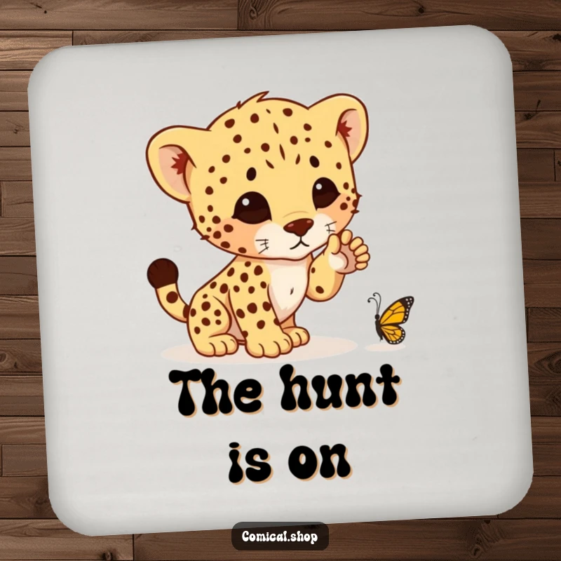 Funny drink coasters showcasing a cheetah cub comically trying to pounce on a butterfly, adding humor to any beverage setting.