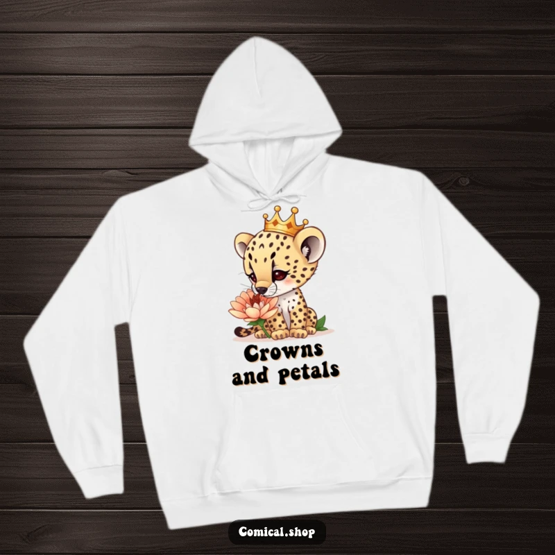 Funny curious cheetah cub wearing a tiny crown, sniffing a giant flower, on a warm hoodie, designed for wonder, a hilarious funny gift.