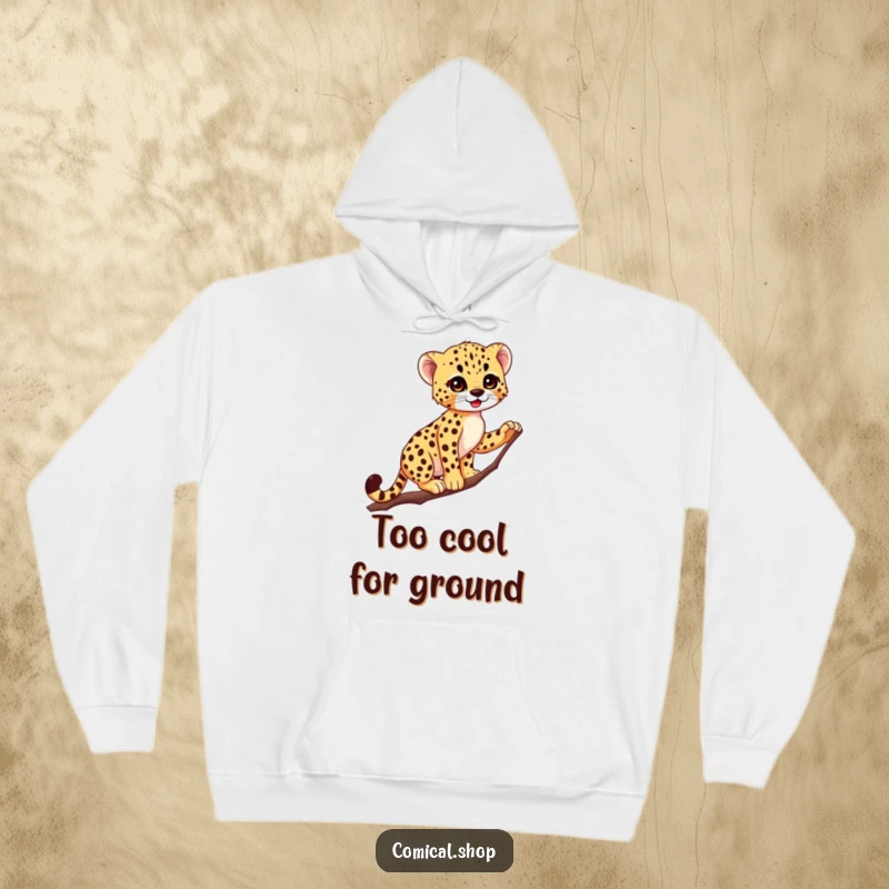 Funny Cheetah Cub Hoodie: A tiny, spotted cub confidently balances on a slender branch, showcasing incredible grace and a playful spirit.
