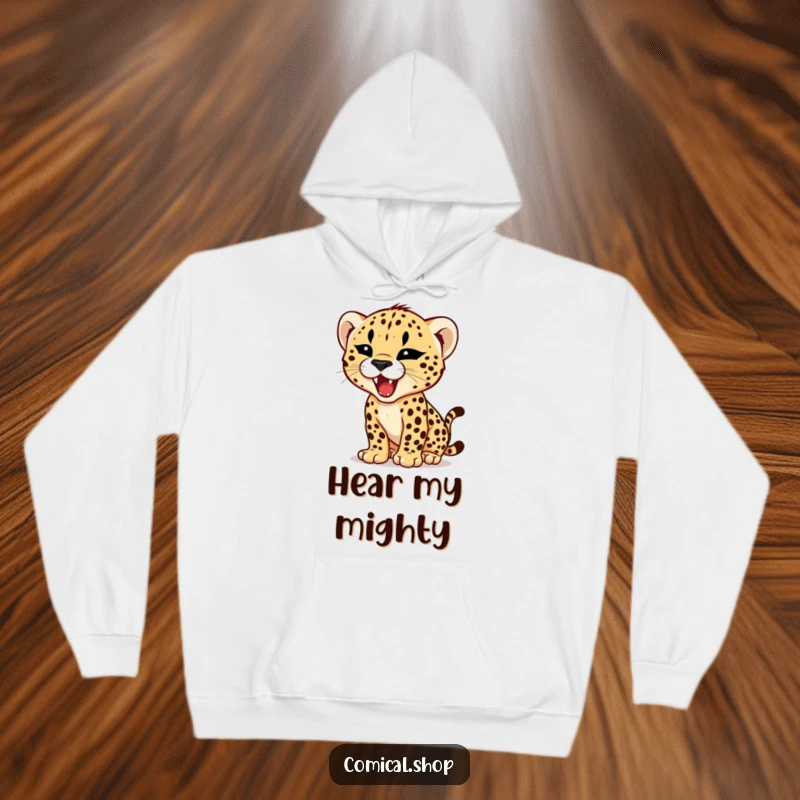Funny hoodie featuring a cheetah cub practicing its roar with a tiny, fierce expression, embodying adorable, hilarious power.