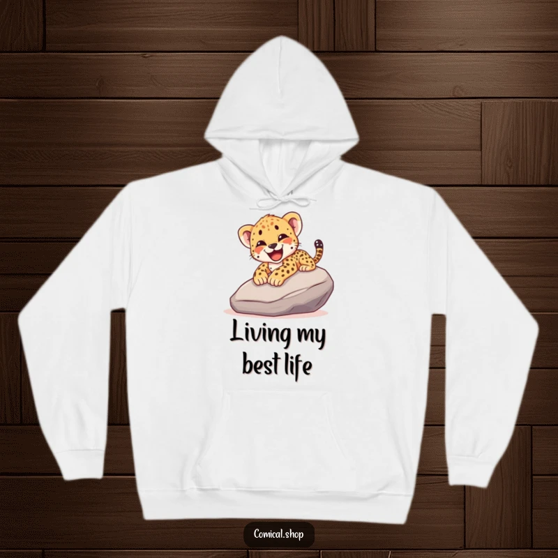 Funny hoodie illustrating a cheetah cub joyfully sliding down a smooth rock, complete with a happy yelp, embodying pure exhilaration.