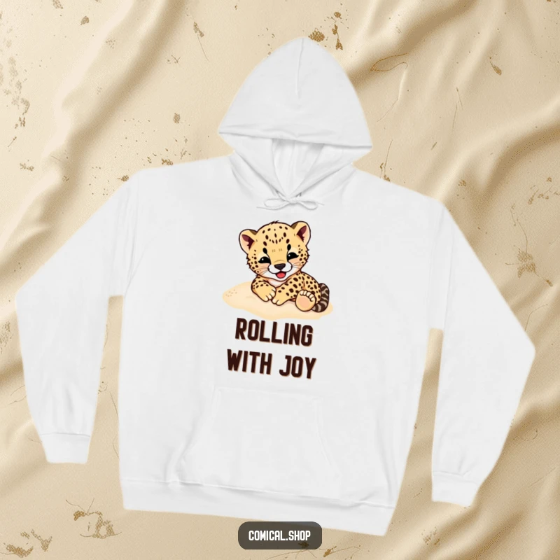 Funny Cheetah Cub Hoodie: A cozy hoodie featuring a cheetah cub gleefully rolling in soft sand, embodying playful freedom.