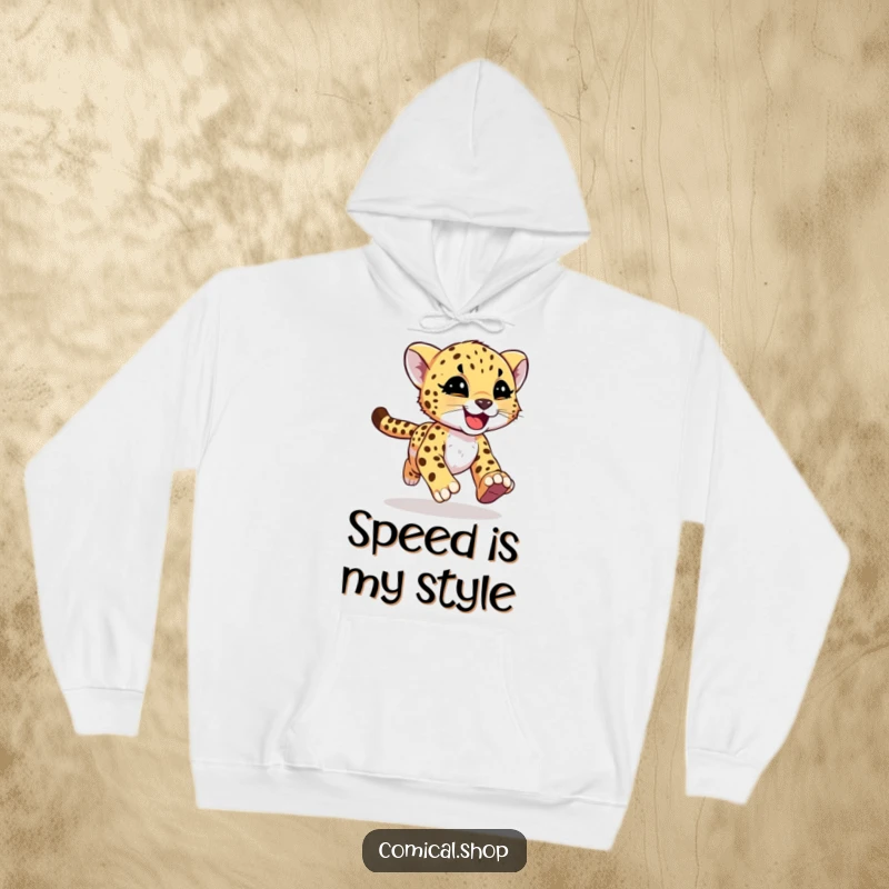 Funny cheetah cub with joyful motion streaks on a cozy hoodie, expressing wild abandon for screen readers.