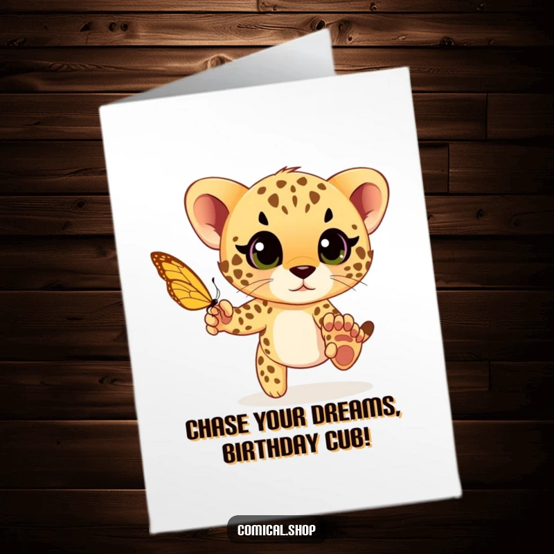 Funny Free Printable Birthday Card: A cheetah cub with wide eyes playfully chases a fluttering butterfly.
