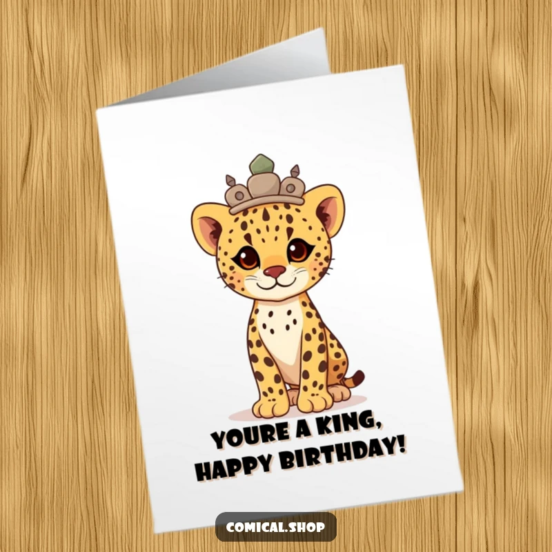 Funny Free Printable Birthday Card: Proud cheetah cub with a stone crown, standing tall and regal on their birthday.