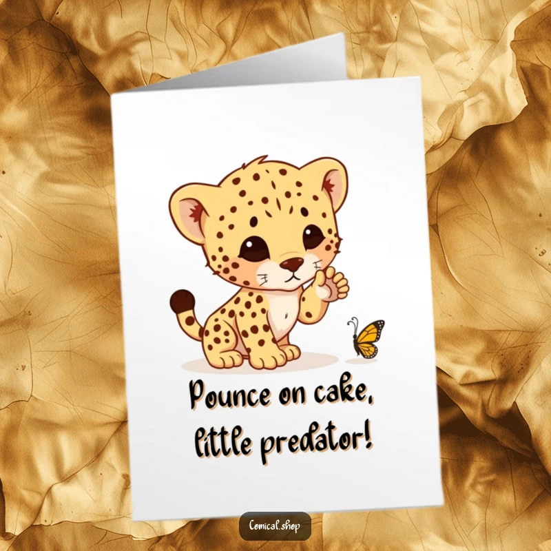 Funny Free Printable Birthday Card: Cheetah cub poised to pounce on a butterfly, a playful surprise for a special day.