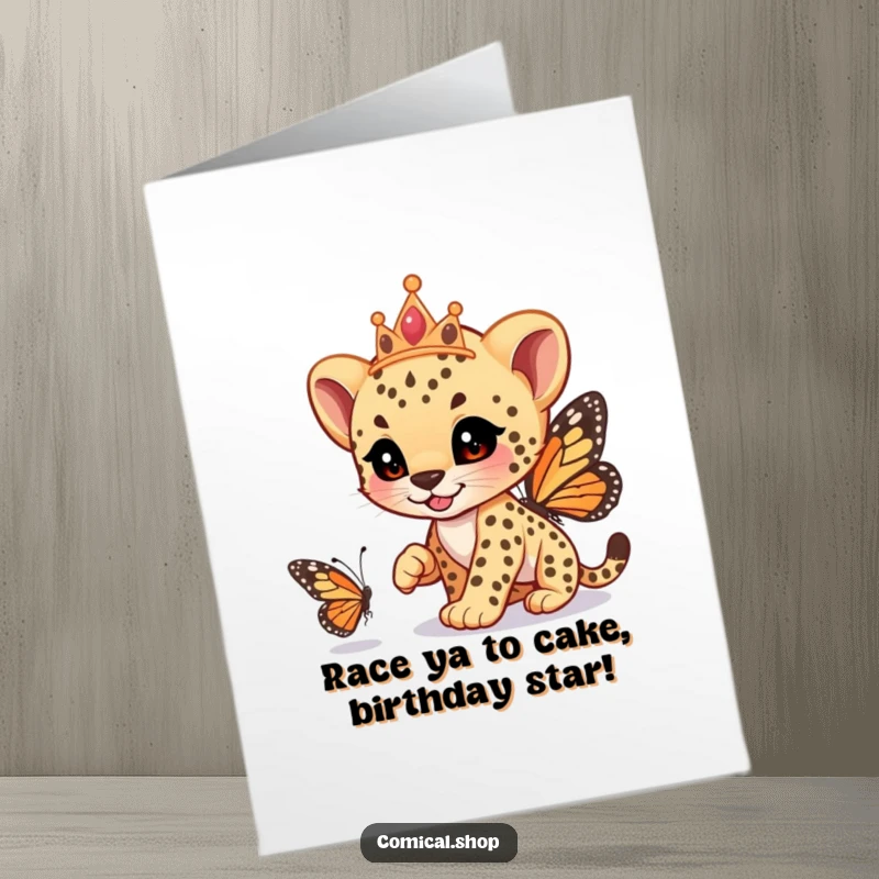 Funny Free Printable Birthday Card: Cheetah cub with tiara playfully chases a butterfly, celebrating birthdays.