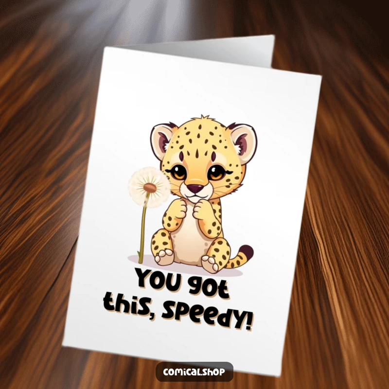 Funny free printable congratulations card depicting a sweet cheetah cub batting at a fluffy dandelion, symbolizing lighthearted victory.