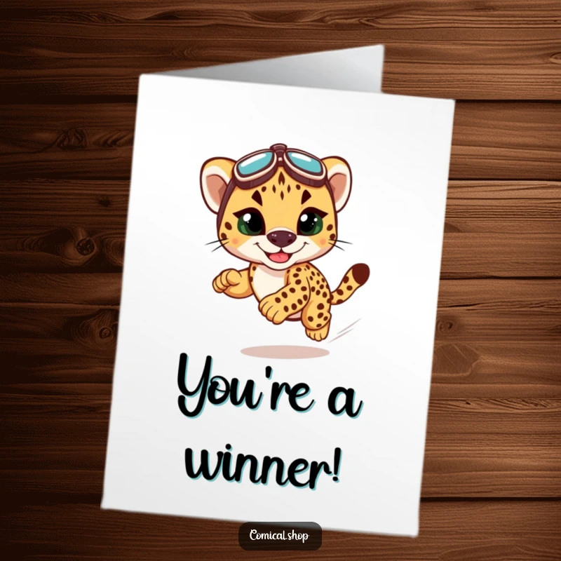 Funny Free Printable Congratulations Card: A cute cheetah cub in racing goggles, grinning as it speeds towards a triumphant finish line.