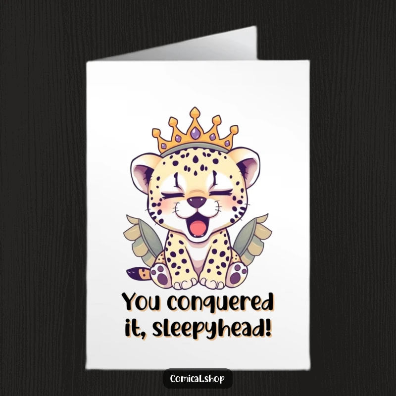 Funny Free Printable Congrats Card: Sleepy cheetah cub in a feathered crown, yawning contentedly after a win.