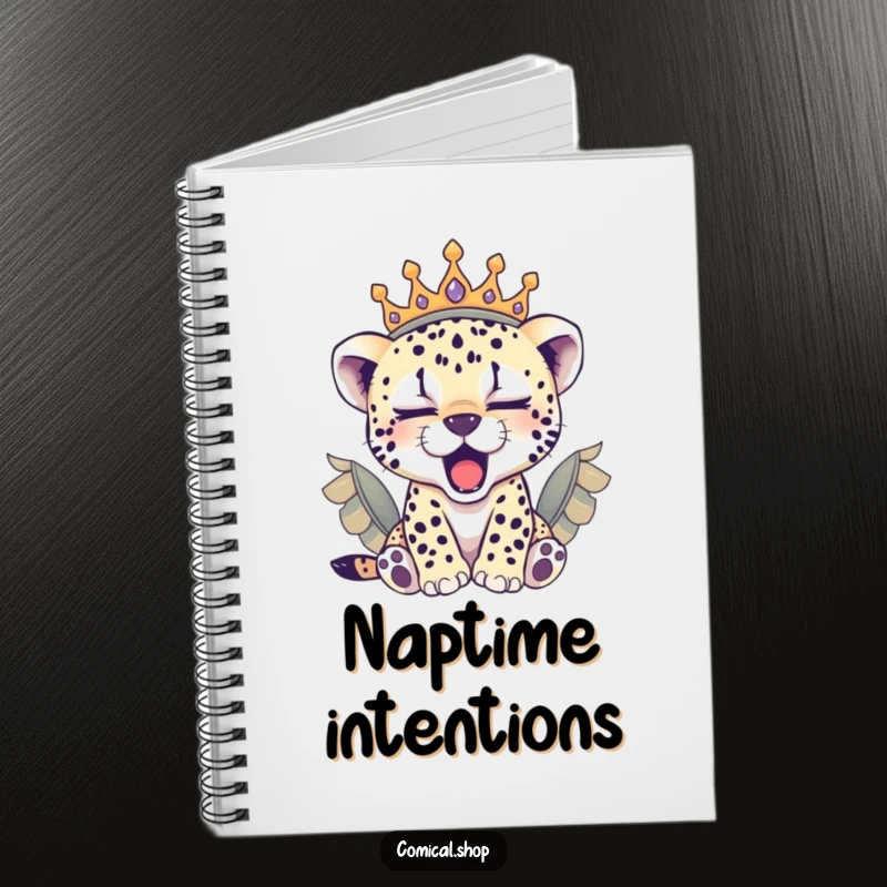 Funny sleepy cheetah cub wearing a feathered crown, yawning on this notebook, inspiring cozy thoughts.