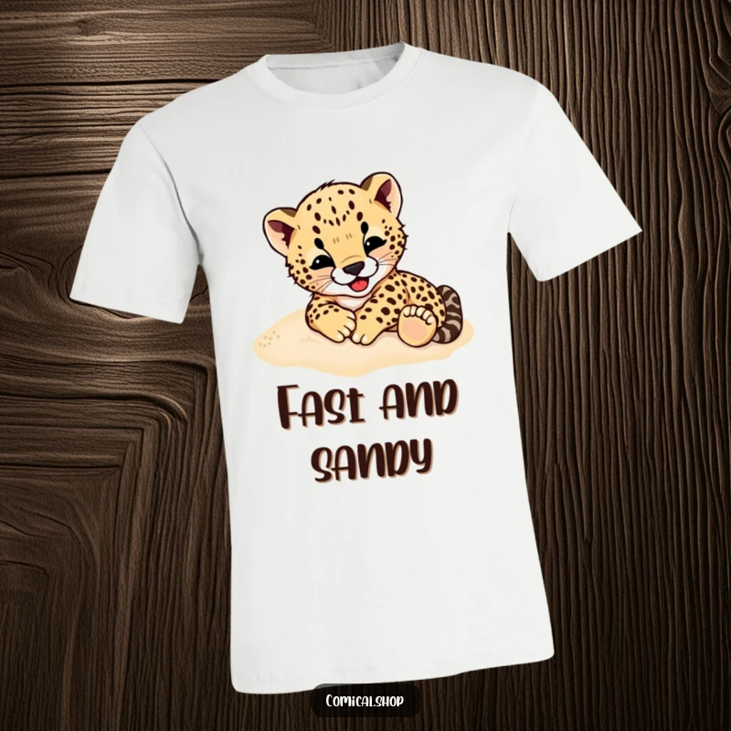 Funny Cheetah Cub T-Shirt: A vibrant tee featuring a cheetah cub joyfully rolling in the sand, full of playful spirit.