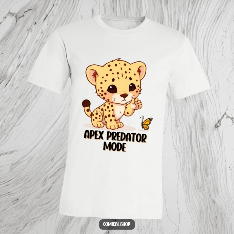 Funny t-shirt with a charming cheetah cub extending a paw, about to hilariously pounce on a tiny butterfly in a playful moment.