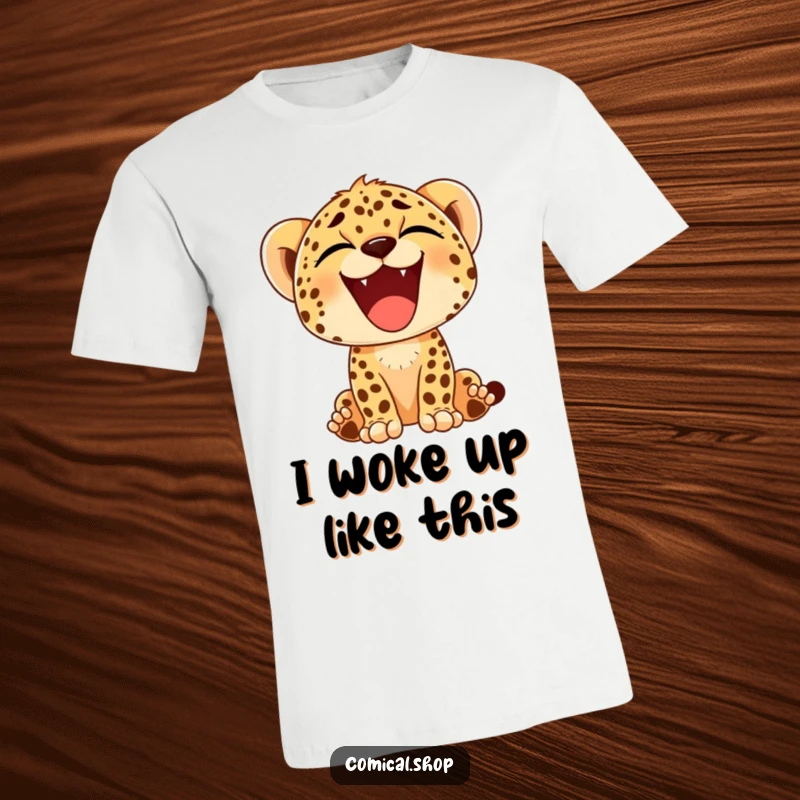Funny t-shirt depicting a cheetah cub mid-yawn, showing off a comically large, happy smile and relaxed, playful demeanor.