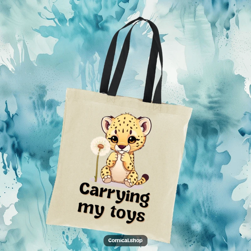 Funny tote bag showing a cheetah cub playfully batting at a dandelion, ideal for carrying items with cute animal flair.