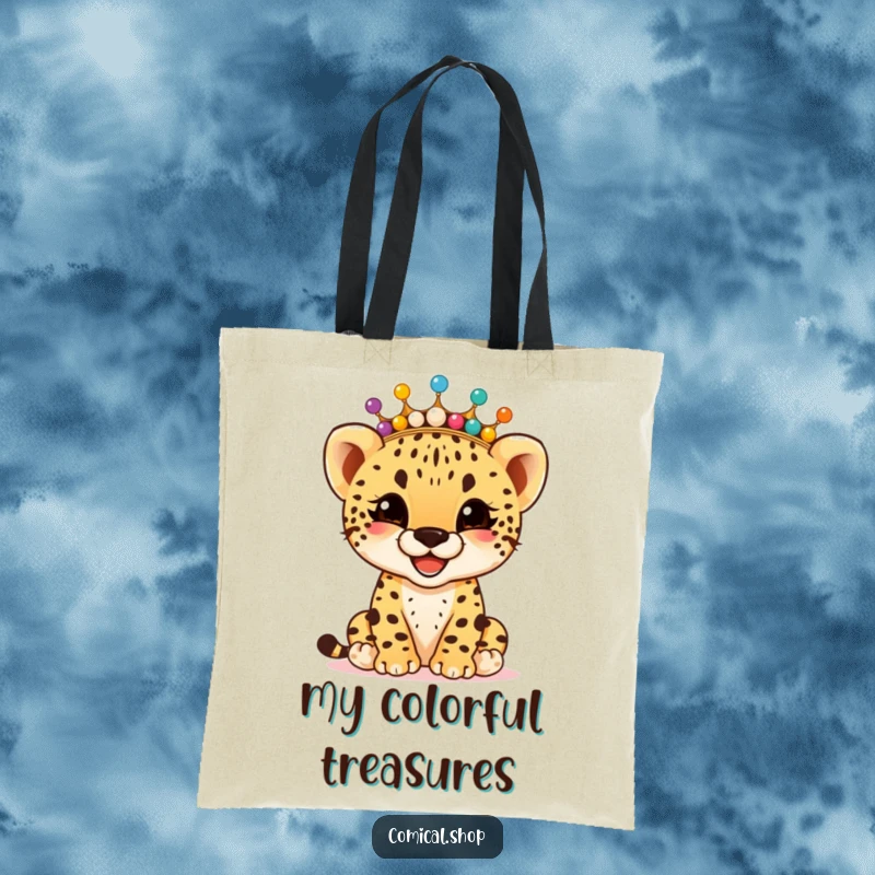 Funny giggling cheetah cub wearing a crown of colorful beads, on a sturdy tote bag, carrying cheer, a funny gift.