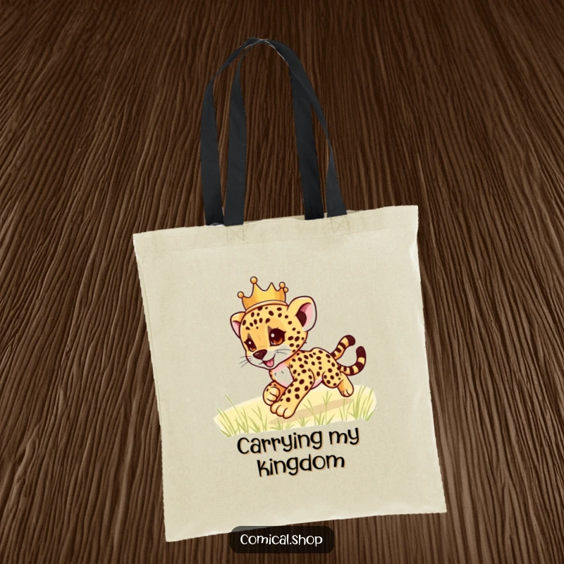 Funny cheetah cub wearing a crown, zooming across a field, on a sturdy tote bag, ready to carry your goods with humor, a funny gift.