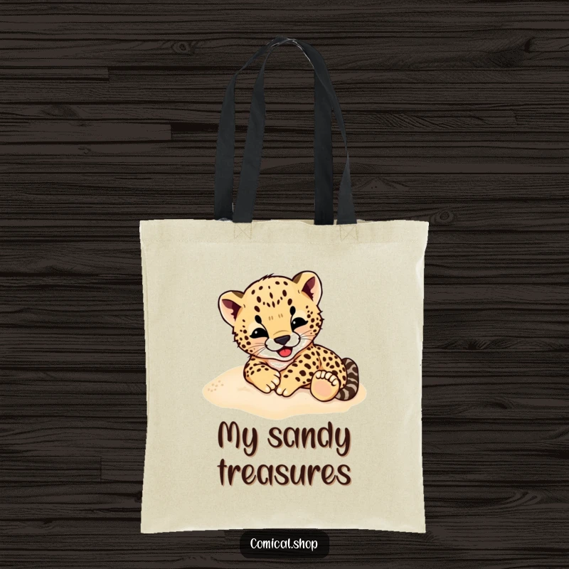Funny Cheetah Cub Tote Bag: A spacious tote bag featuring a cheetah cub gleefully rolling around in the sand.
