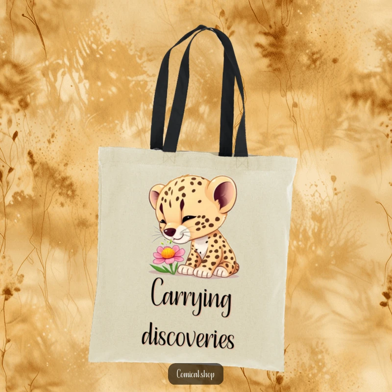 Funny cheetah cub wonder tote bag featuring a curious cub smelling a flower, perfect for carrying items with charm and humor.