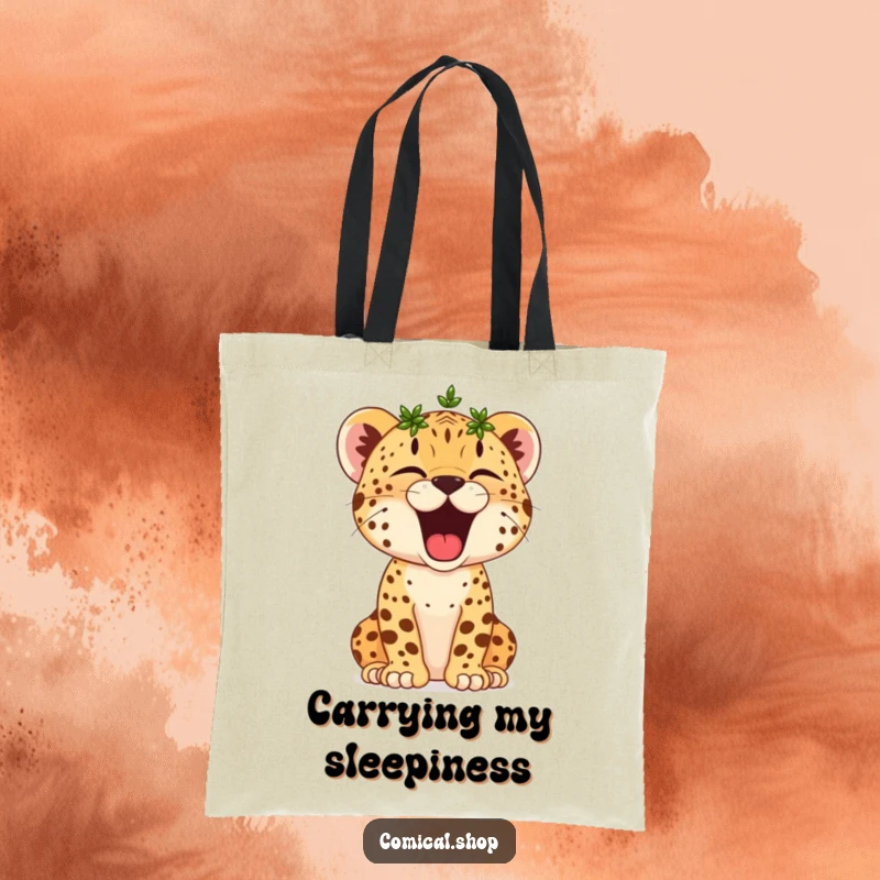Funny Cheetah Cub Tote Bag: A small cheetah cub wearing a laurel wreath yawns widely, looking adorably triumphant and sleepy.