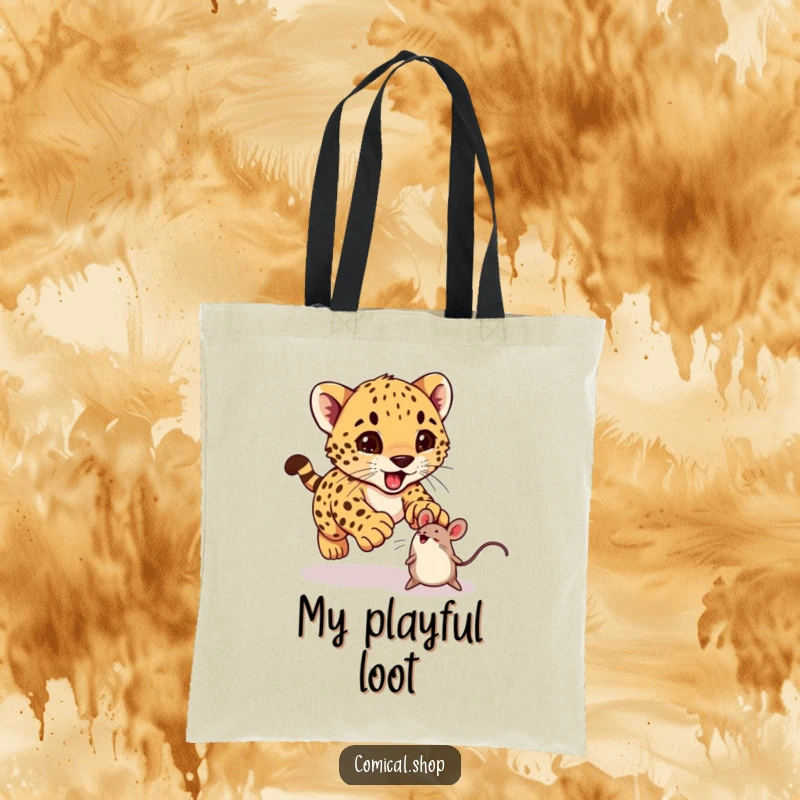 Funny cheetah cub excitedly pouncing on a bouncing toy mouse on a tote bag, ideal for shoppers.